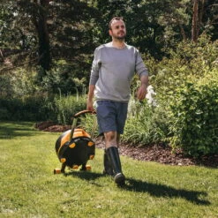 Fiskars Schlauchwagen Waterwheel Automatik XL, Für ½'-5/8", Schlauchdüse, Rasenspieß, Schwarz-orange -Garten Sicht Verkäufe 0930200501 Schlauchwagen Automatik XL mit Raedern 360 4 78977